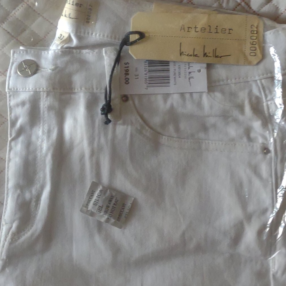 White skinny rip jeans